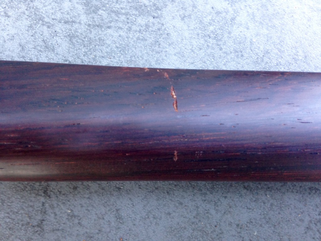 Cocobolo Bokuto (Detail) with crack from light contact with Lignum Vitae Bokuto